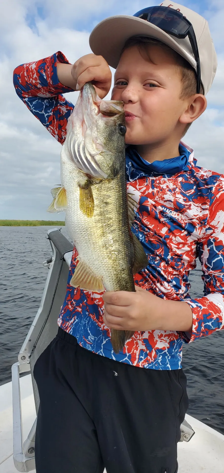 A kiss for his Okeechobee bass